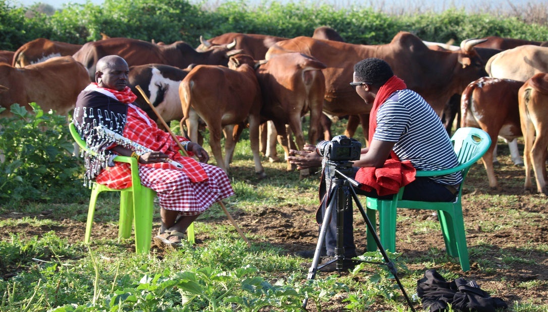 Mathias Tooko interviewing one Maasai Traditional Leader during this program.