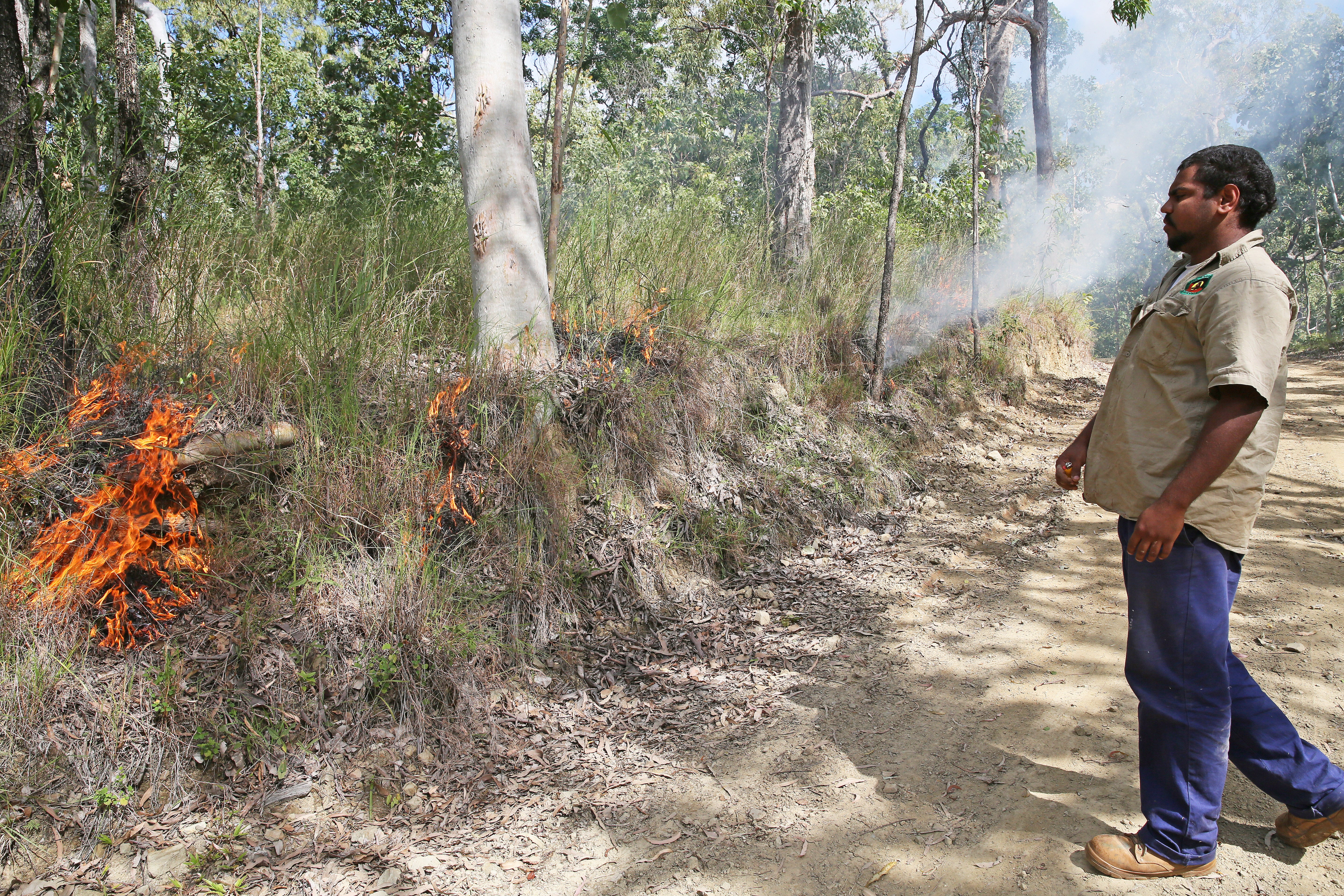 Aboriginal cultural burning practices of lighting small, low-intensity cool fires before the vegetation gets too dense and dry later in the season, ensures health of the land and its peoples.  Photo © Gleb Raygorodetsky 